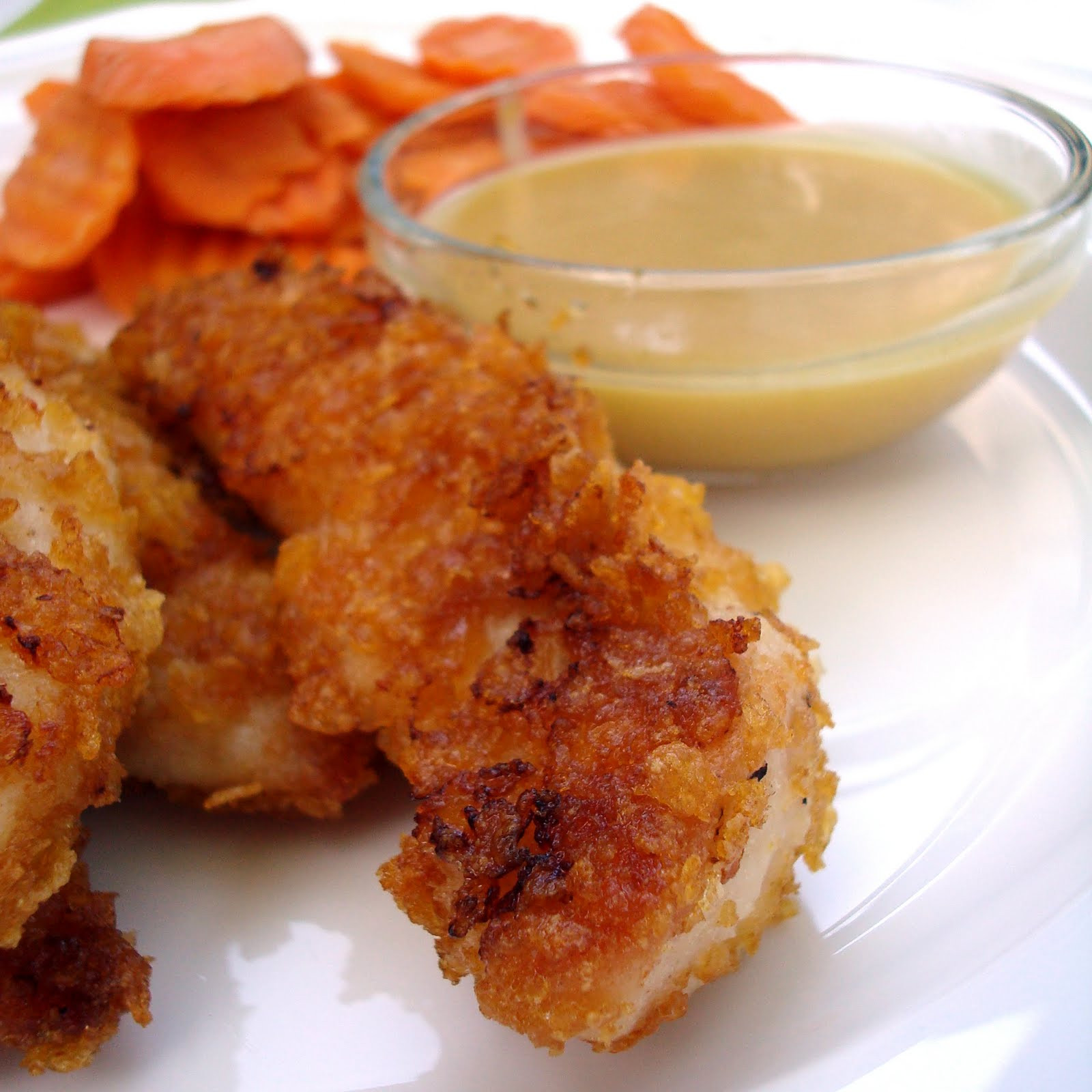 Cornflake Chicken Tenders
 Ommy Noms Cornflake Chicken Tenders with Homemade Honey