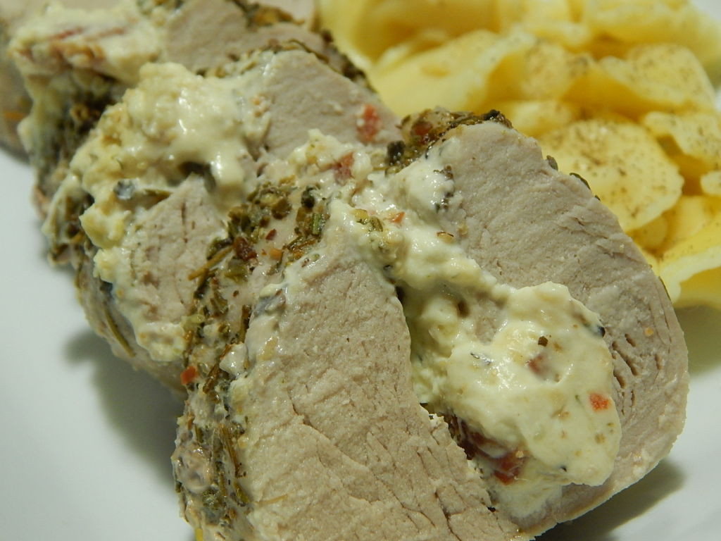 Cream Cheese Stuffed Pork Tenderloin
 Herb & garlic cream cheese and bacon stuffed pork