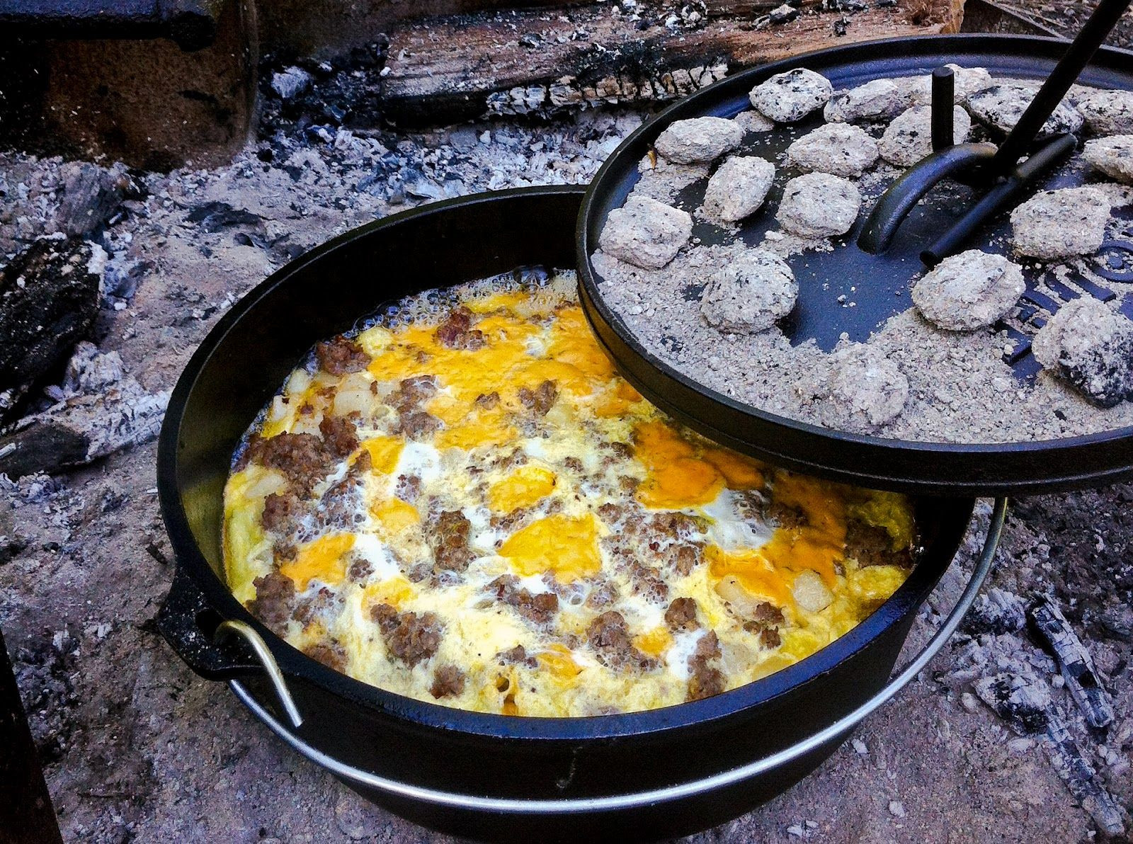 Dutch Oven Breakfast Recipes
 Mountain Man Breakfast Casserole cooked over hot coals in