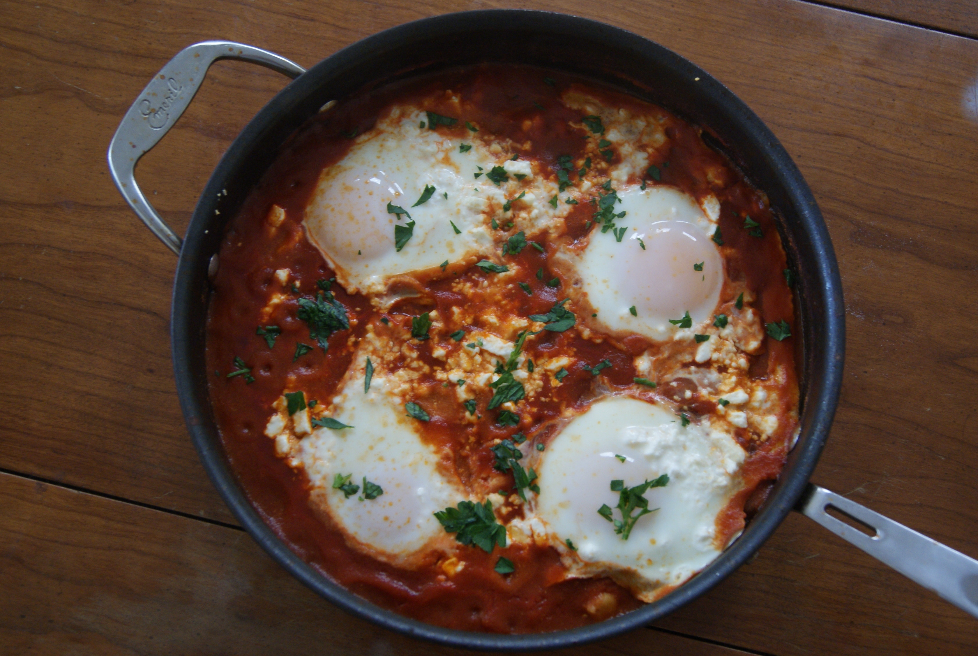 Eggs In Tomato Sauce
 Eggs Baked in Spicy Tomato Sauce with Chickpeas and Feta