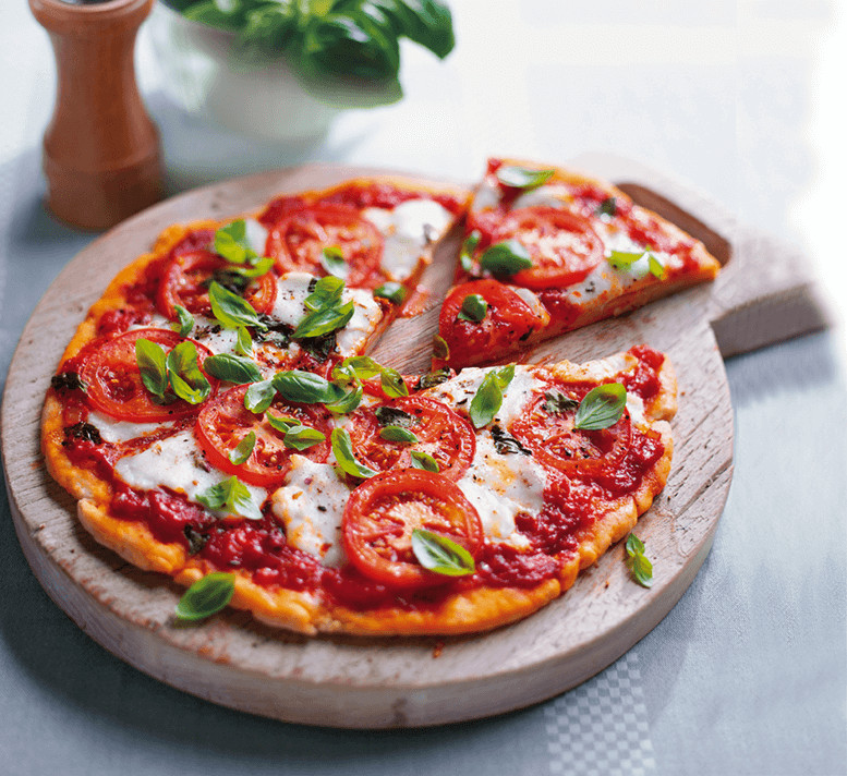 Fat Tomato Pizza
 Healthy pizza with tomato and mozzarella Healthy Food Guide