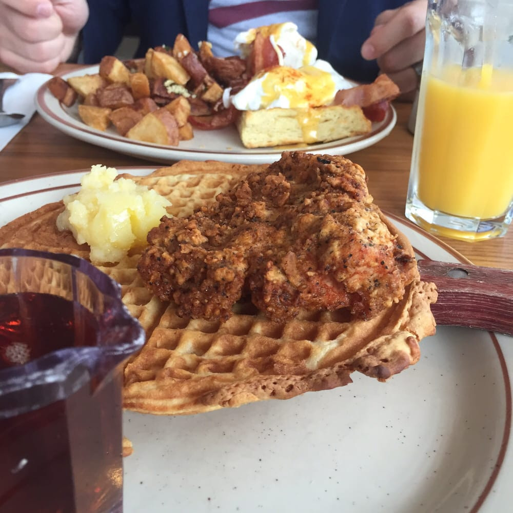 Fats Chicken And Waffles
 Chicken & waffles eggs Benedict in the background Both