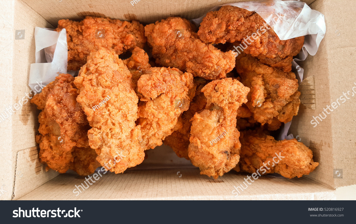 Fried Chicken Delivery
 Crispy Kentucky Fried Chicken Delivery Box Stock