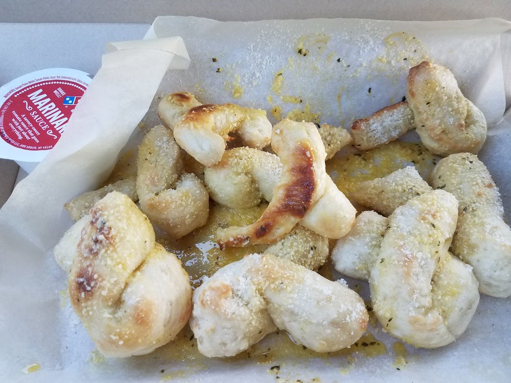 Garlic Bread Twists Dominos
 Parmesan bread twist Under cooked and disgusting Yelp