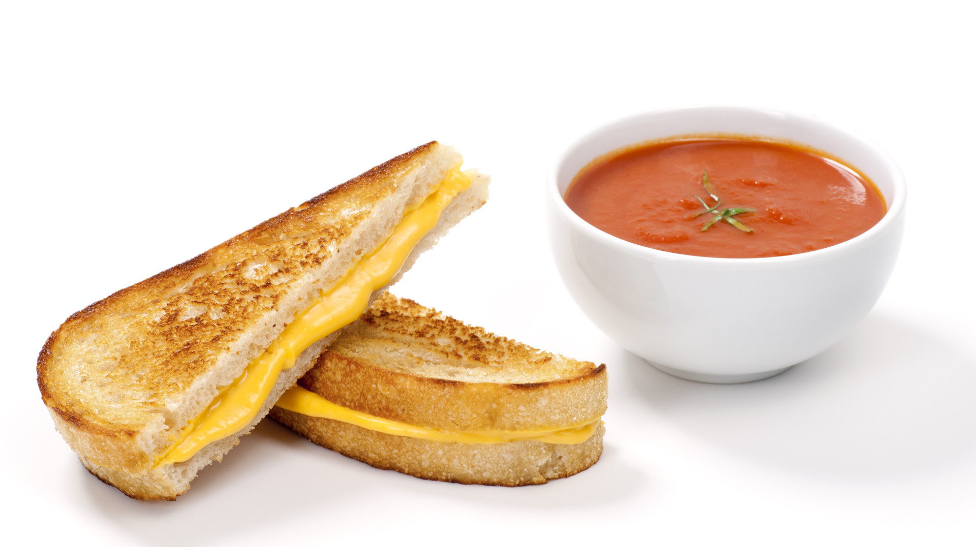 Grilled Cheese And Tomato Soup
 Tomato soup filled grilled cheese balls reimagine a