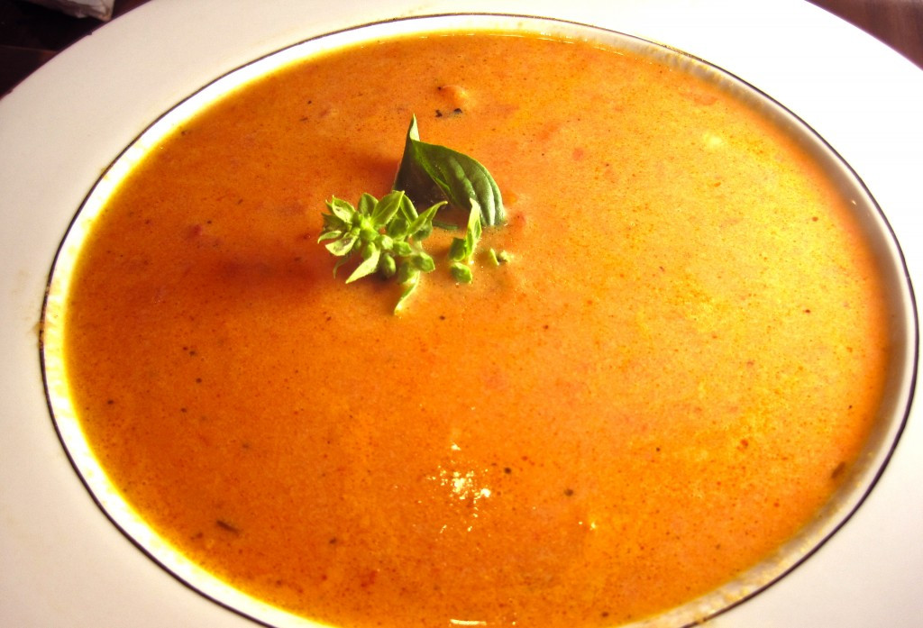 Homemade Tomato Basil Soup
 Bowl of Homemade Tomato Soup with Basil Garnish