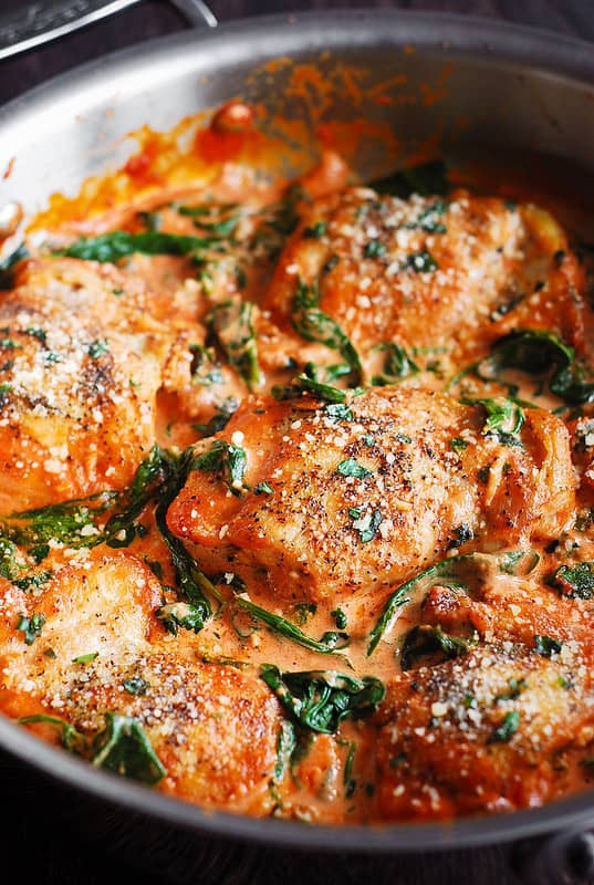 How Long Does It Take To Bake Chicken Thighs
 Skillet Chicken Thighs with Creamy Tomato Basil Spinach