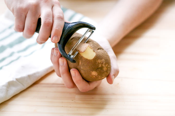 How To Peel A Potato
 How to Peel Potatoes The Cookful