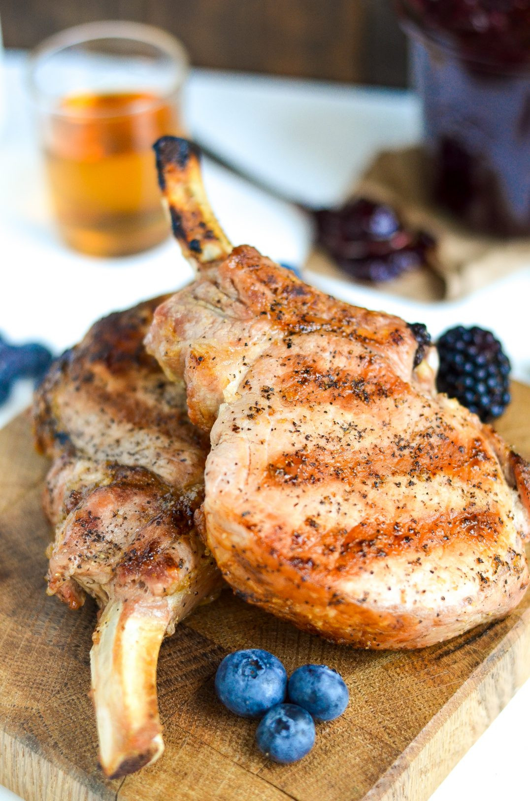 How To Season Pork Chops
 Grilled Pork Chops with Bourbon Berry BBQ Sauce