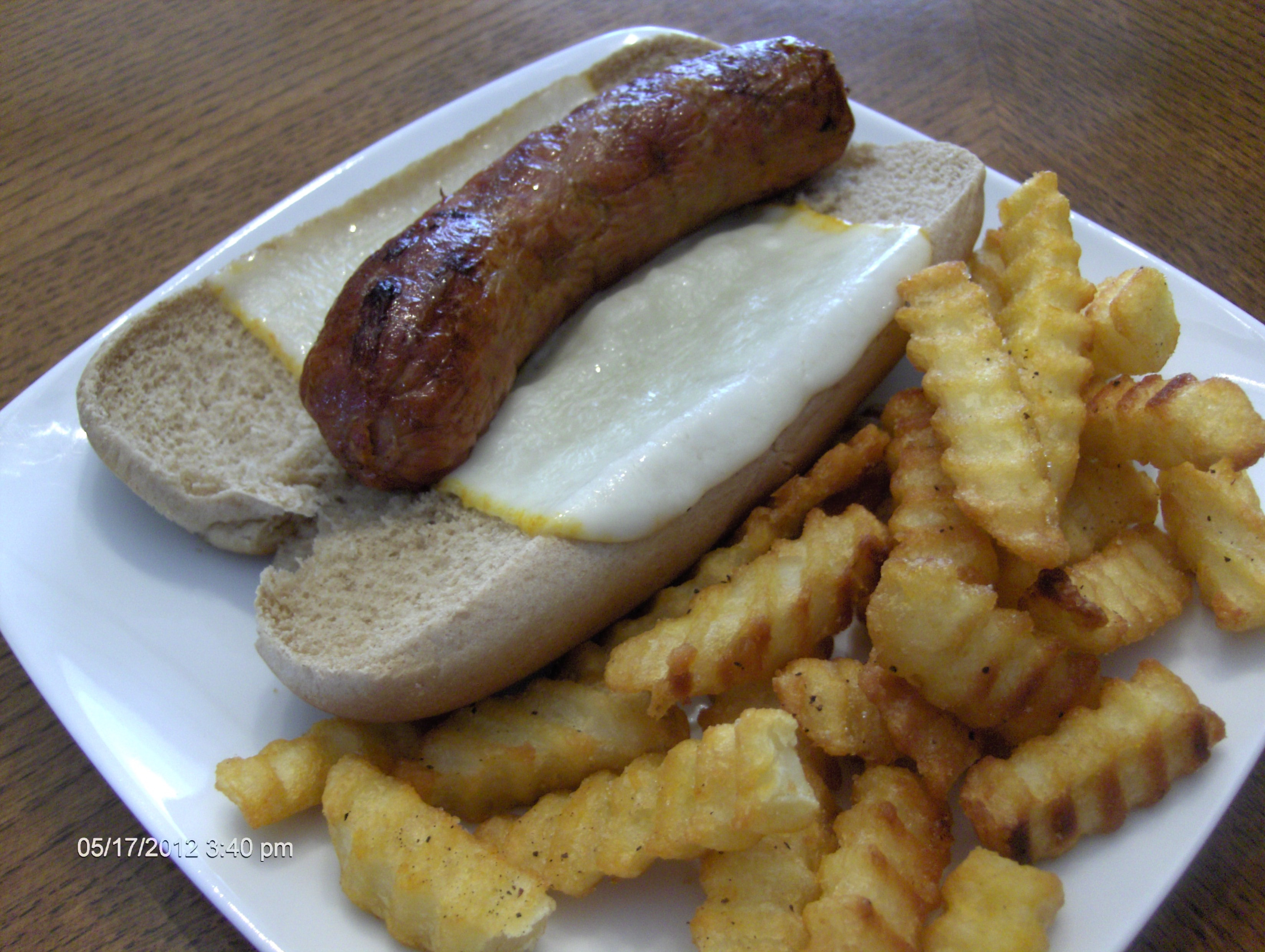 Italian Turkey Sausage
 Grilled Hot Italian Turkey Sausage on Baked Bun w Baked