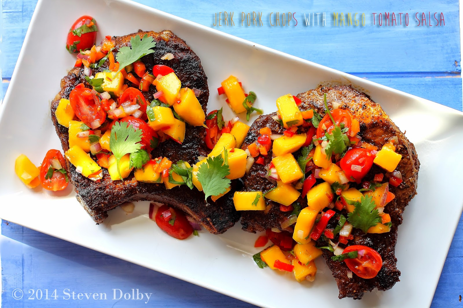 Jerk Pork Chops
 Grilled Jerk Pork Chops with Mango Tomato Salsa by Steven