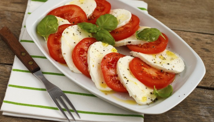 Mozzarella Tomato Salad
 Tomato Mozzarella Salad with Spiked Pine Nuts and Basil