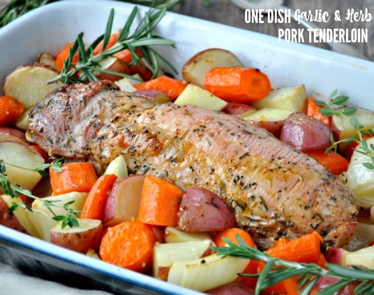 Oven Baked Pork Loin
 pork roast and potatoes in the oven
