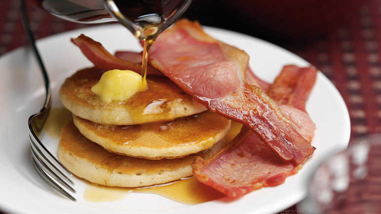 Pancakes And Bacon
 Recipe Bacon and maple syrup drizzled pancakes