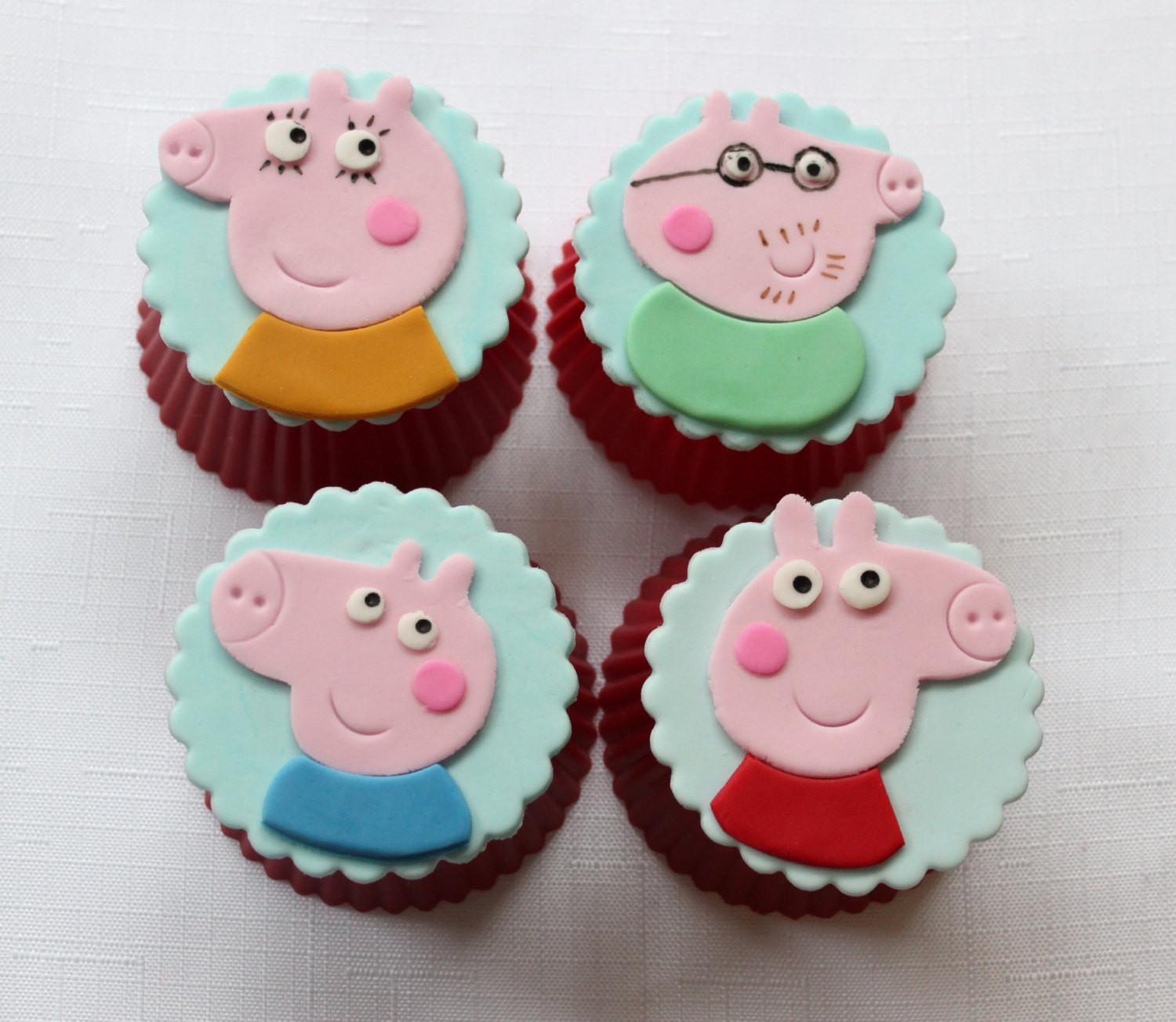 Peppa Pig Cupcakes
 12 peppa pig cupcake toppers edible fondant birthday topper