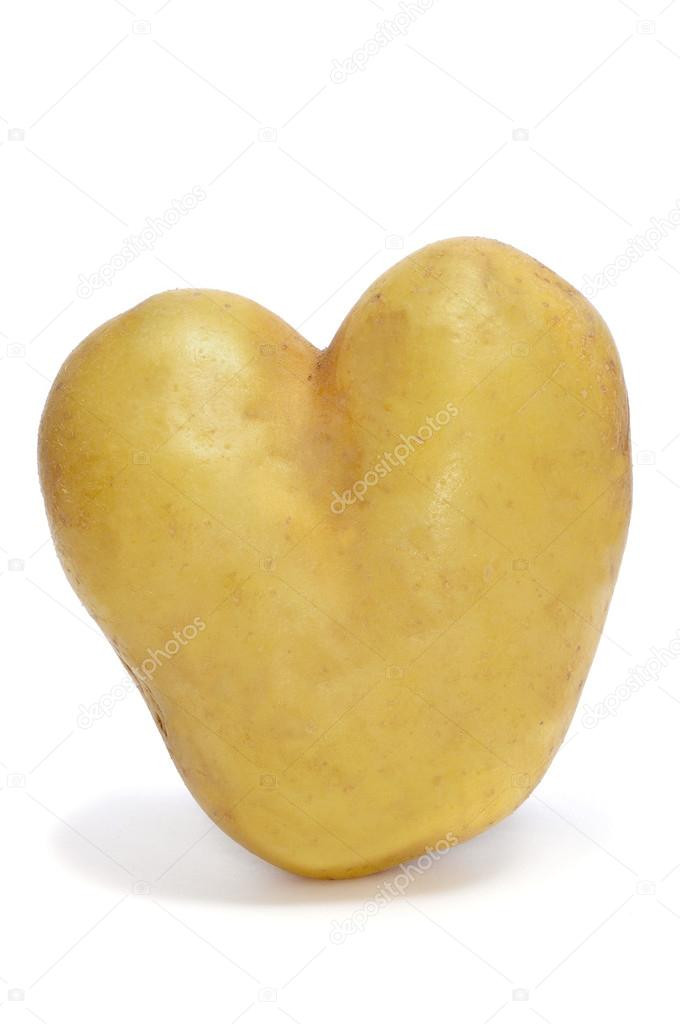 Potato For A Heart
 Heart shaped potato — Stock © nito103