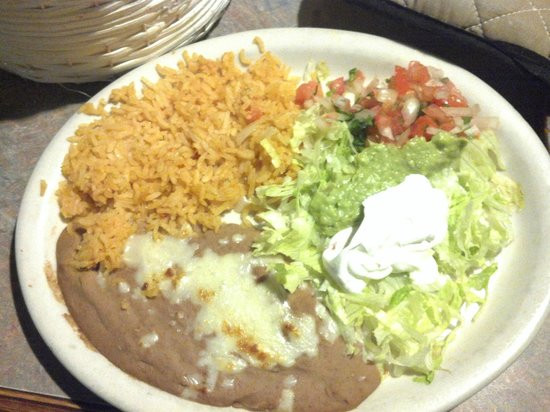 Rice And Beans Restaurant
 The usual rice and beans with a guacamole salad Picture