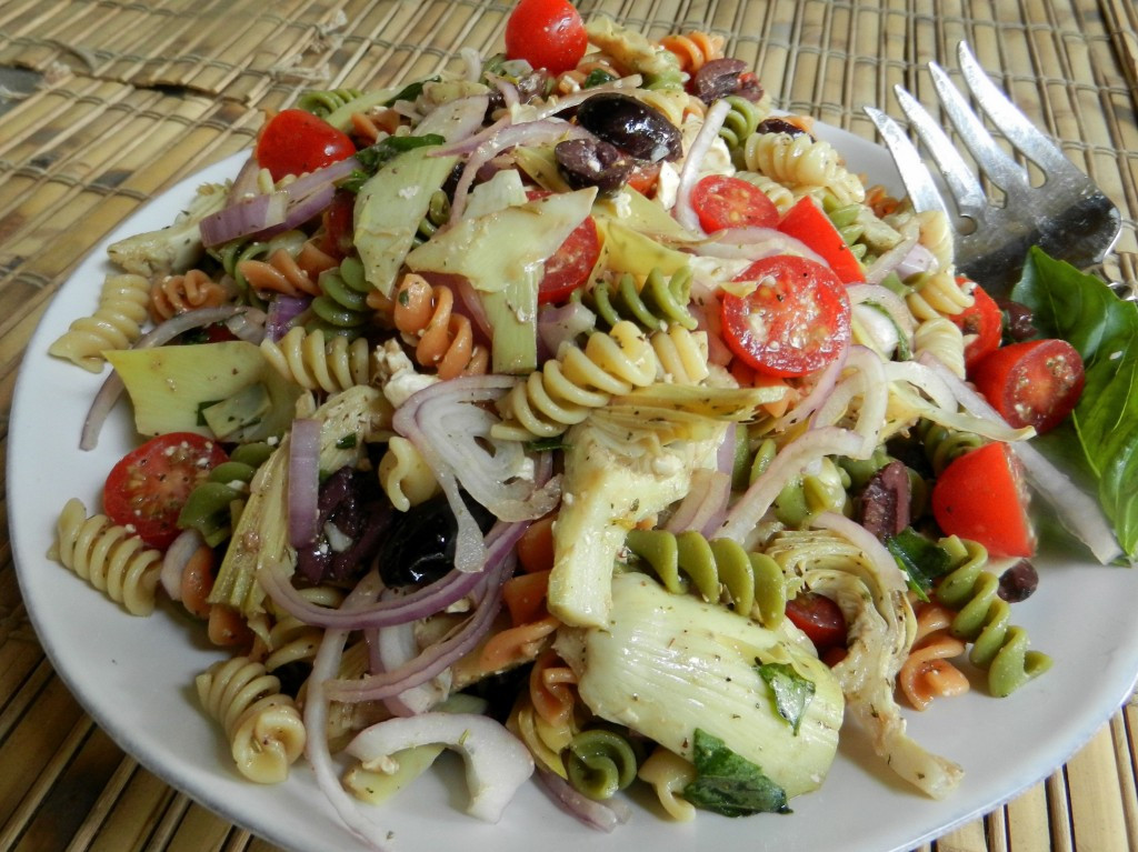 Rotini Pasta Salad
 Cold Rotini Pasta Salad with Tomatoes and Artichoke Hearts