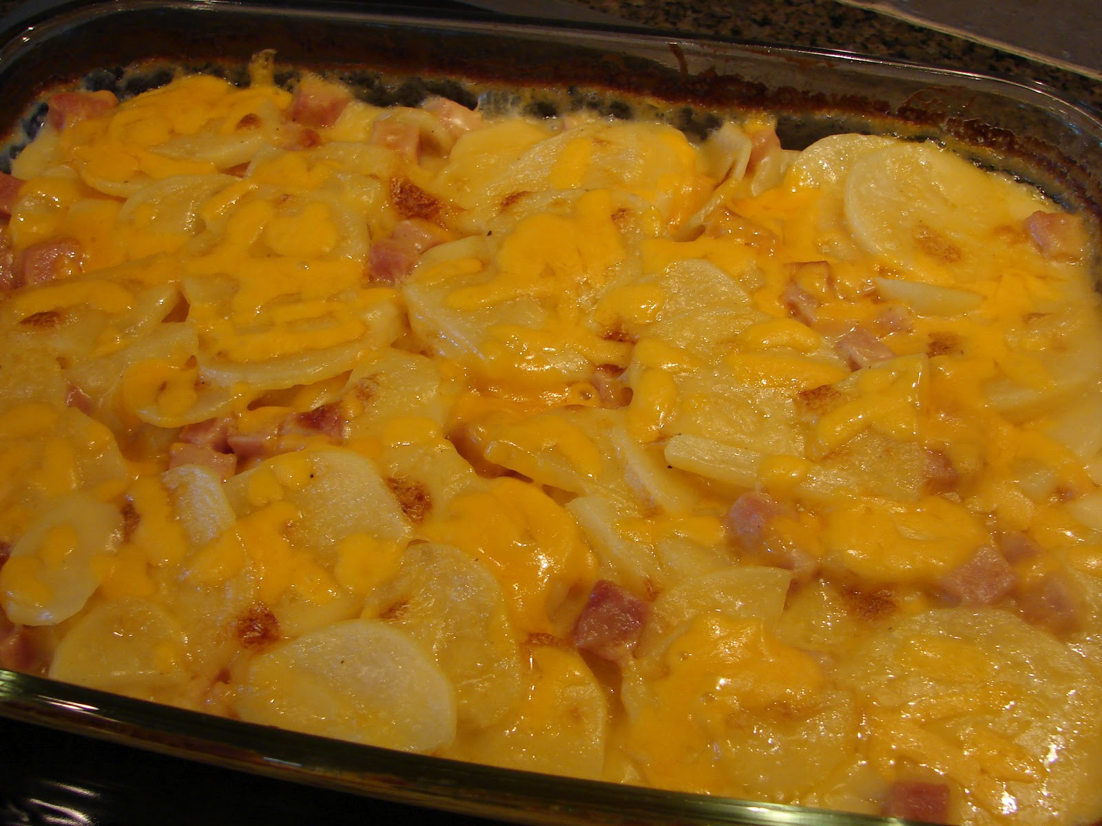 Scalloped Potato Casserole
 A Bear in the Kitchen Cheesy Scalloped Potatoes & Ham