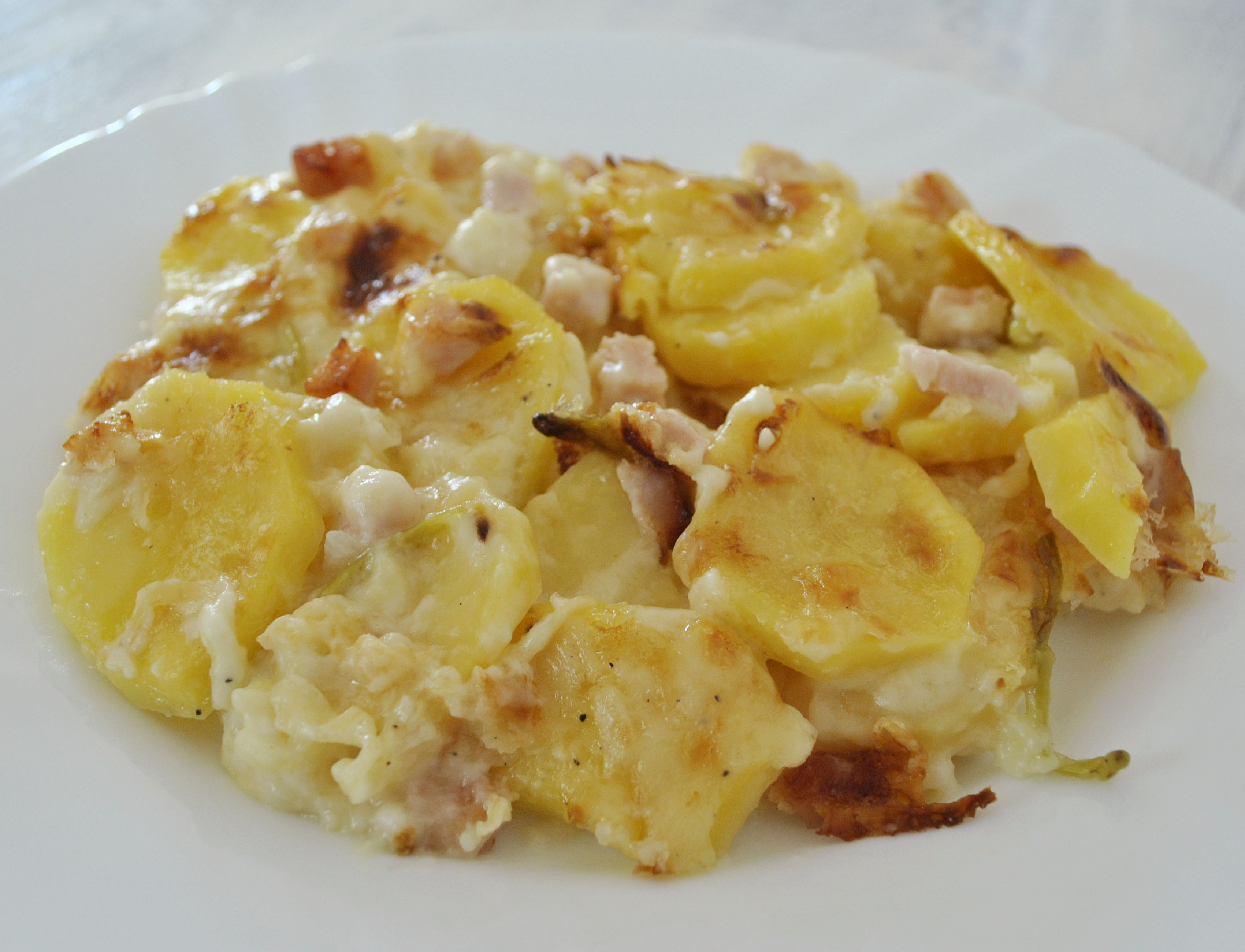 Scalloped Potato Ham
 How to Make Scalloped Potatoes and Ham with