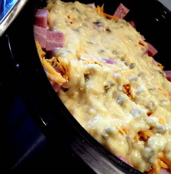 Scalloped Potatoes And Ham Crock Pot
 Cheesy Ham and Scalloped Potatoes Crock Pot Recipe