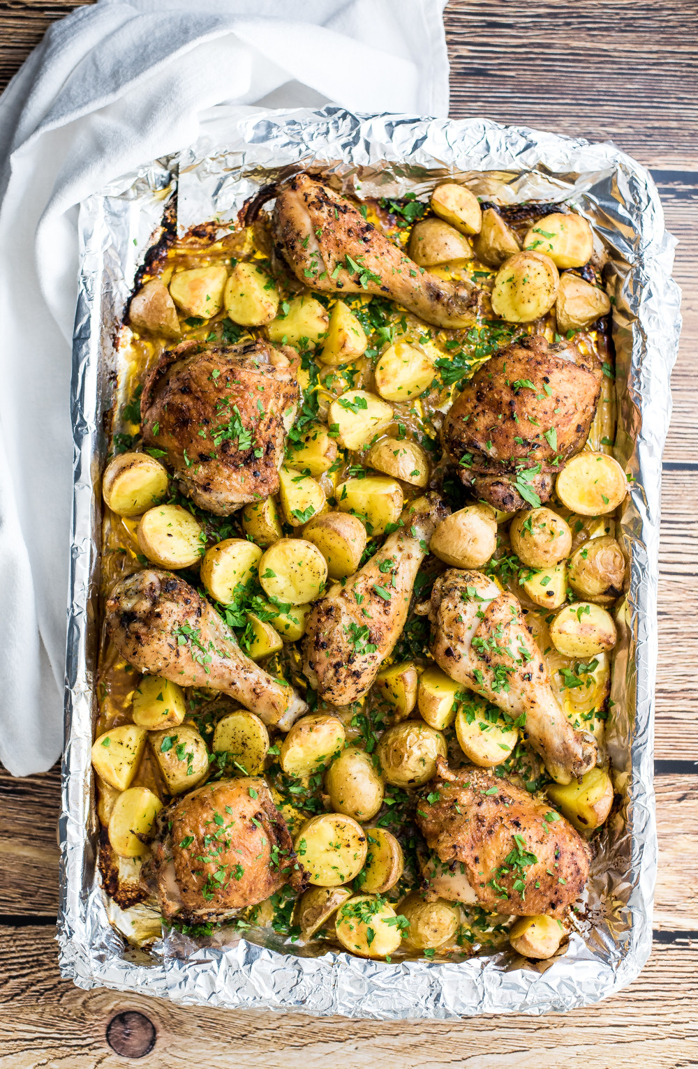 Sheet Pan Dinner
 Spicy Garlic Chicken and Potatoes Sheet Pan Dinner