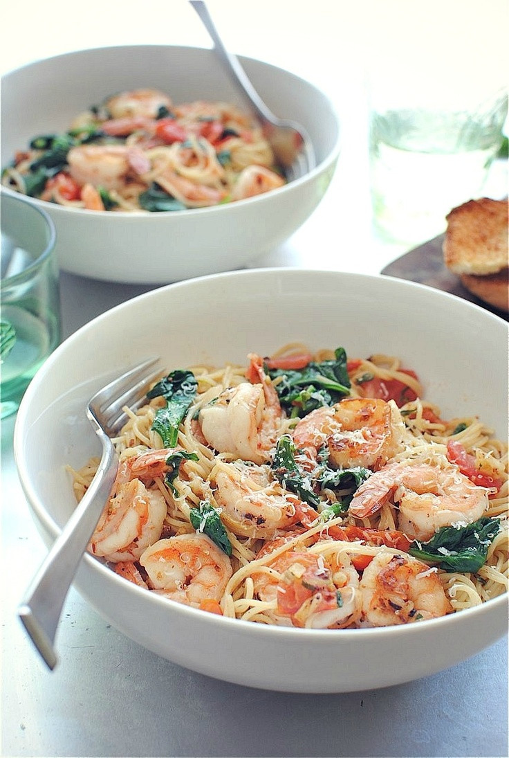 Shrimp And Spinach Pasta
 Shrimp Pasta with tomatoes lemons and spinach via