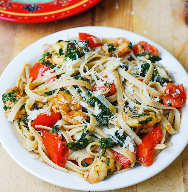 Shrimp Tomato Pasta
 Shrimp tomato and spinach pasta in garlic butter sauce