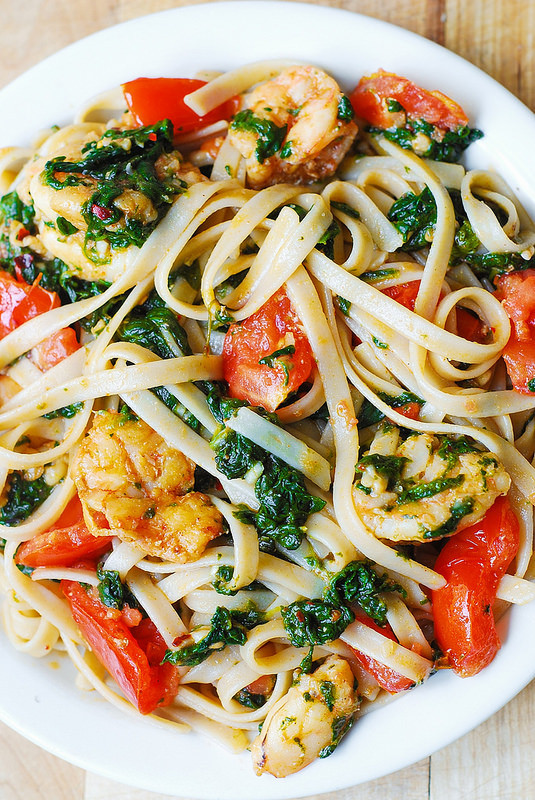 Shrimp Tomato Pasta
 Shrimp tomato and spinach pasta in garlic butter sauce