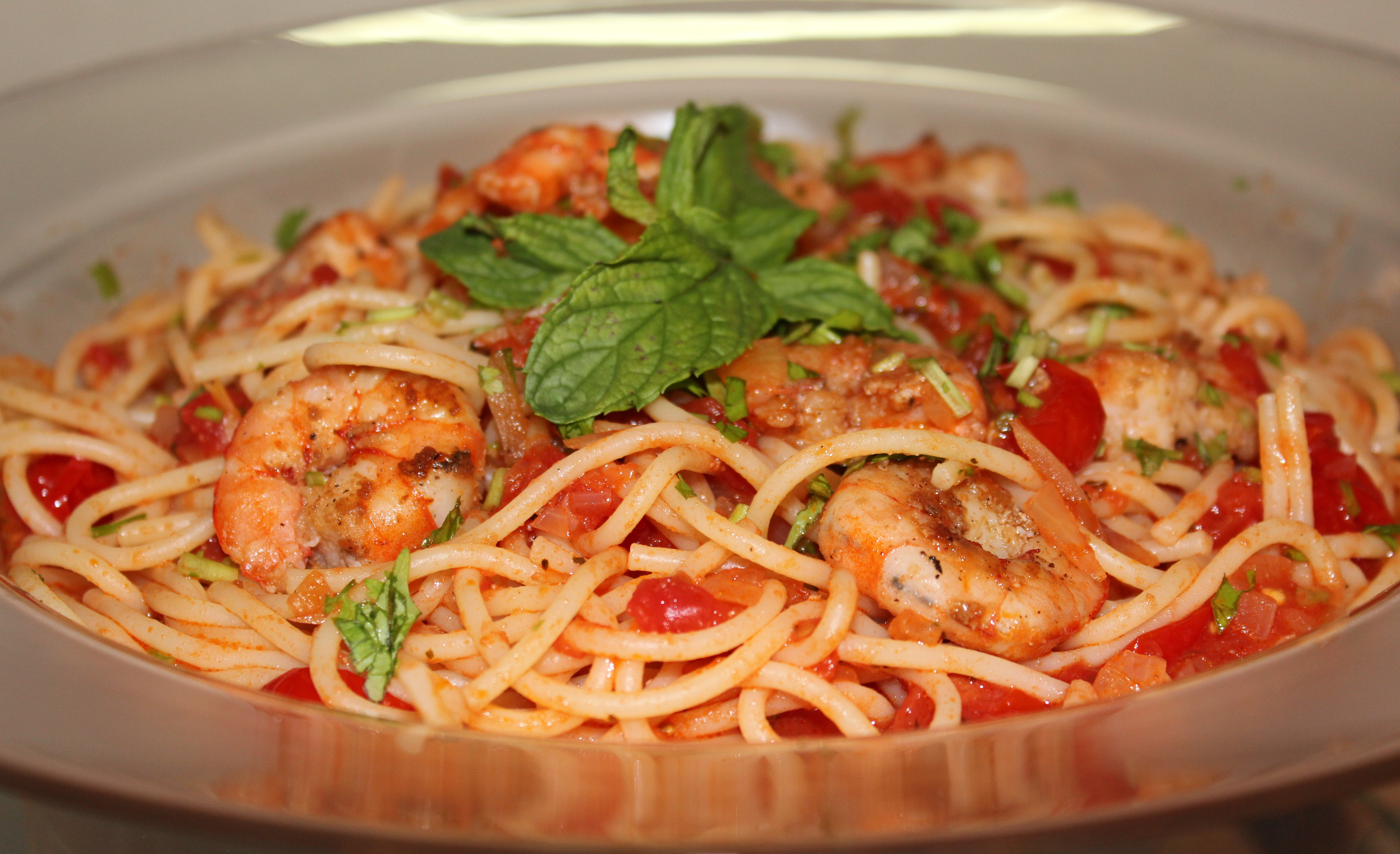 Shrimp With Pasta
 Sauteed Shrimp and Tomatoes Over Pasta