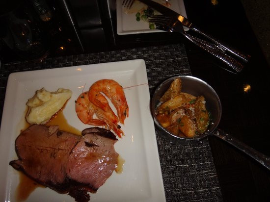 Shrimps And Prime Rib
 mash potato shrimp prime rib and duck confit with