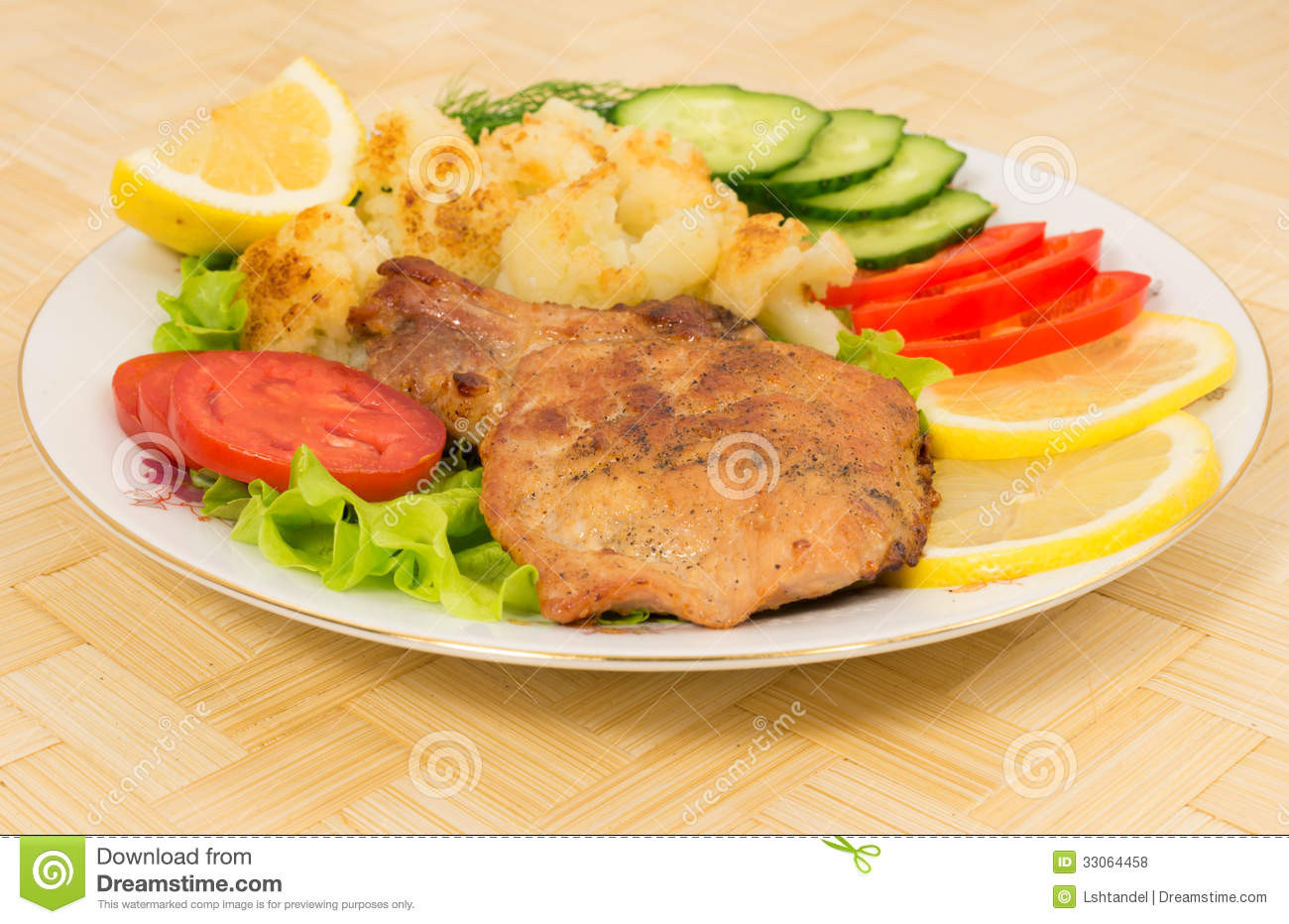 Side Dishes For Grilled Pork Chops
 Grilled Pork Chop With A Side Dish Cauliflower And