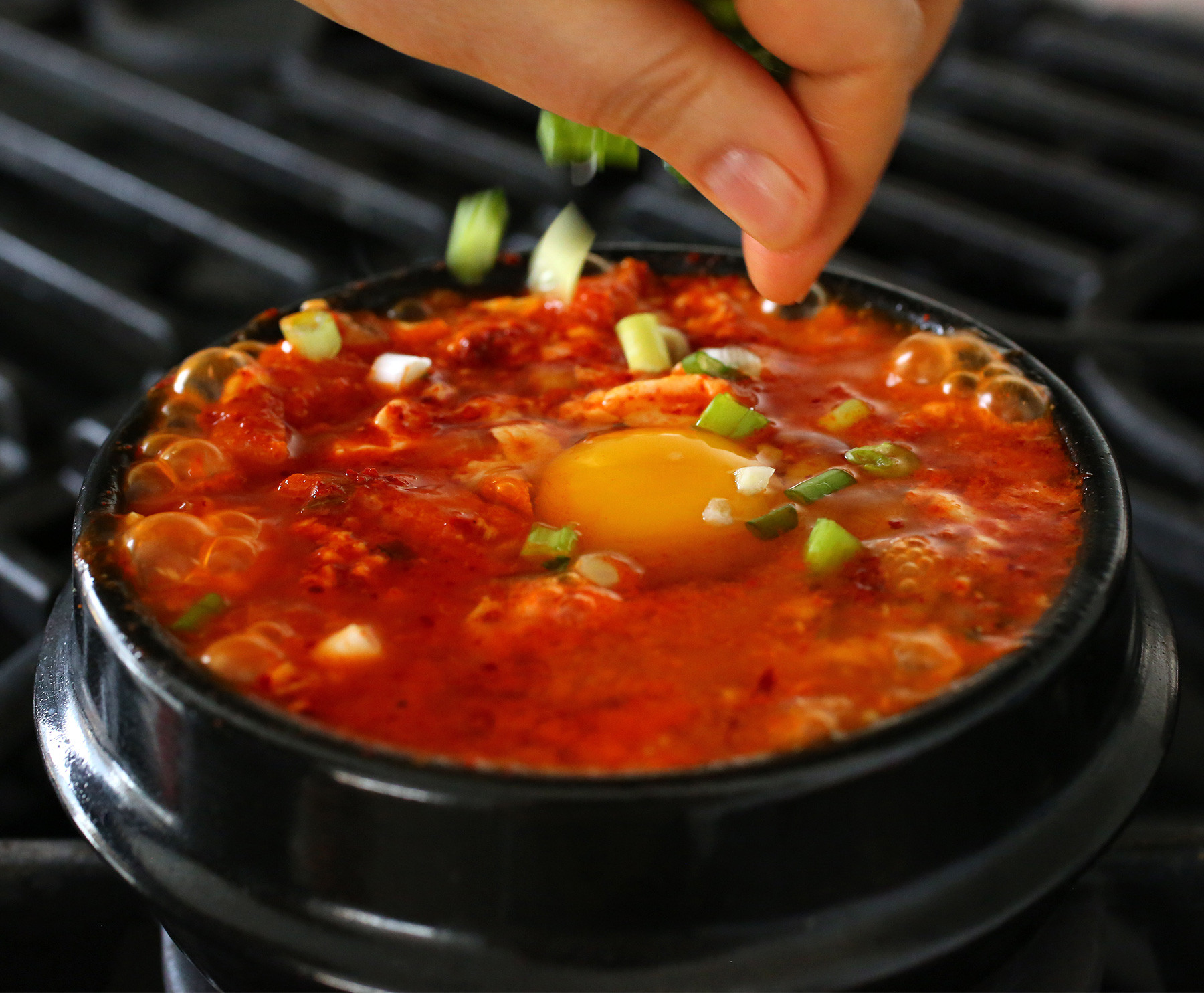 Soft Tofu Recipes
 Spicy soft tofu stew with kimchi and pork belly recipe