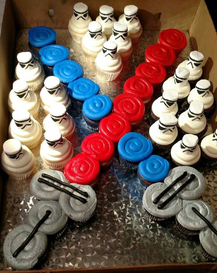 Star Wars Cupcakes
 Star Wars Lightsaber and Stormtrooper cupcakes I drew the