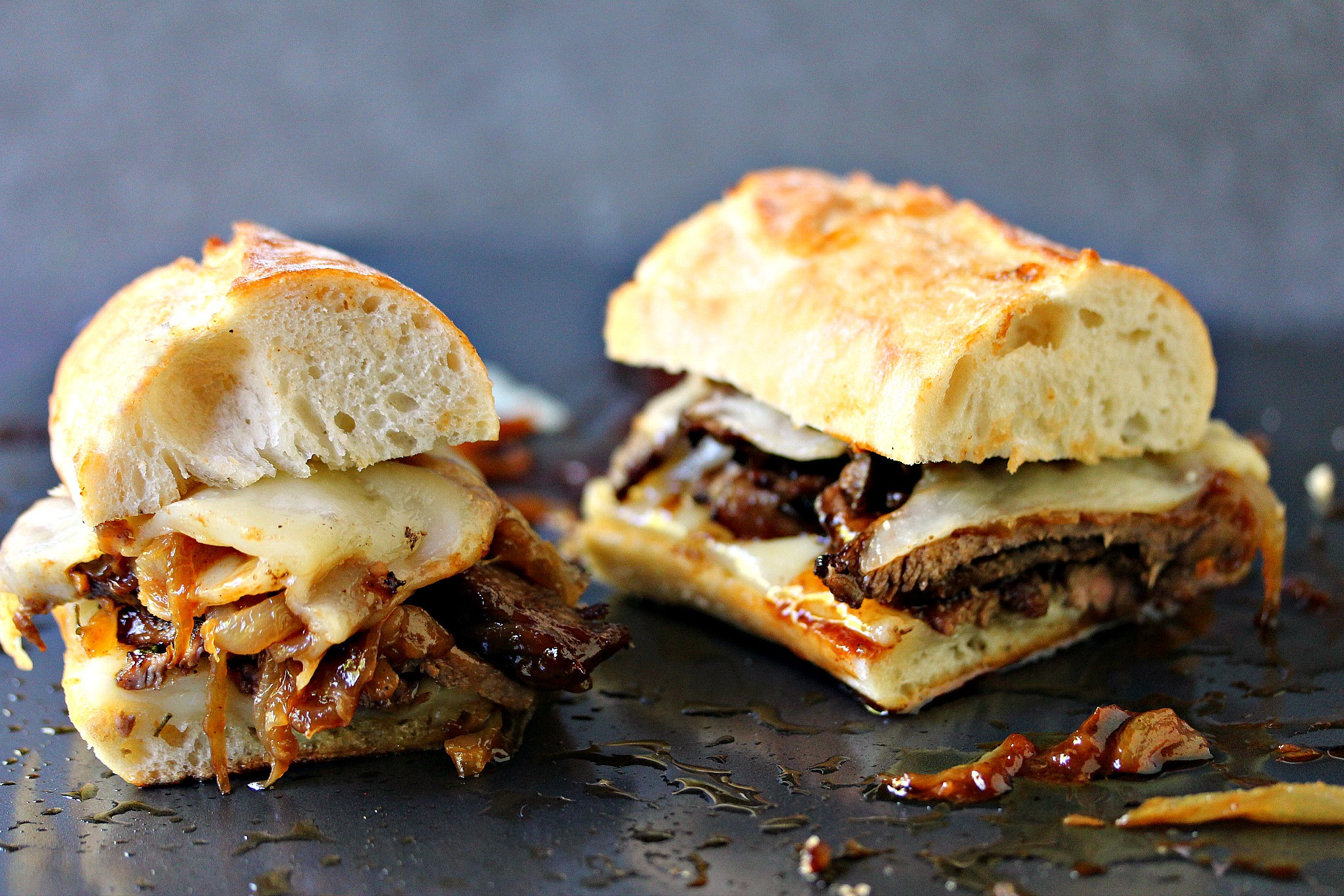 Steak And Cheese Sandwiches
 Steak Sandwiches with Caramelized ions and Provolone Cheese