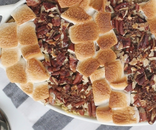 Sweet Potato Casserole With Marshmallows And Pecans
 sweet potato casserole with pecan and marshmallow topping