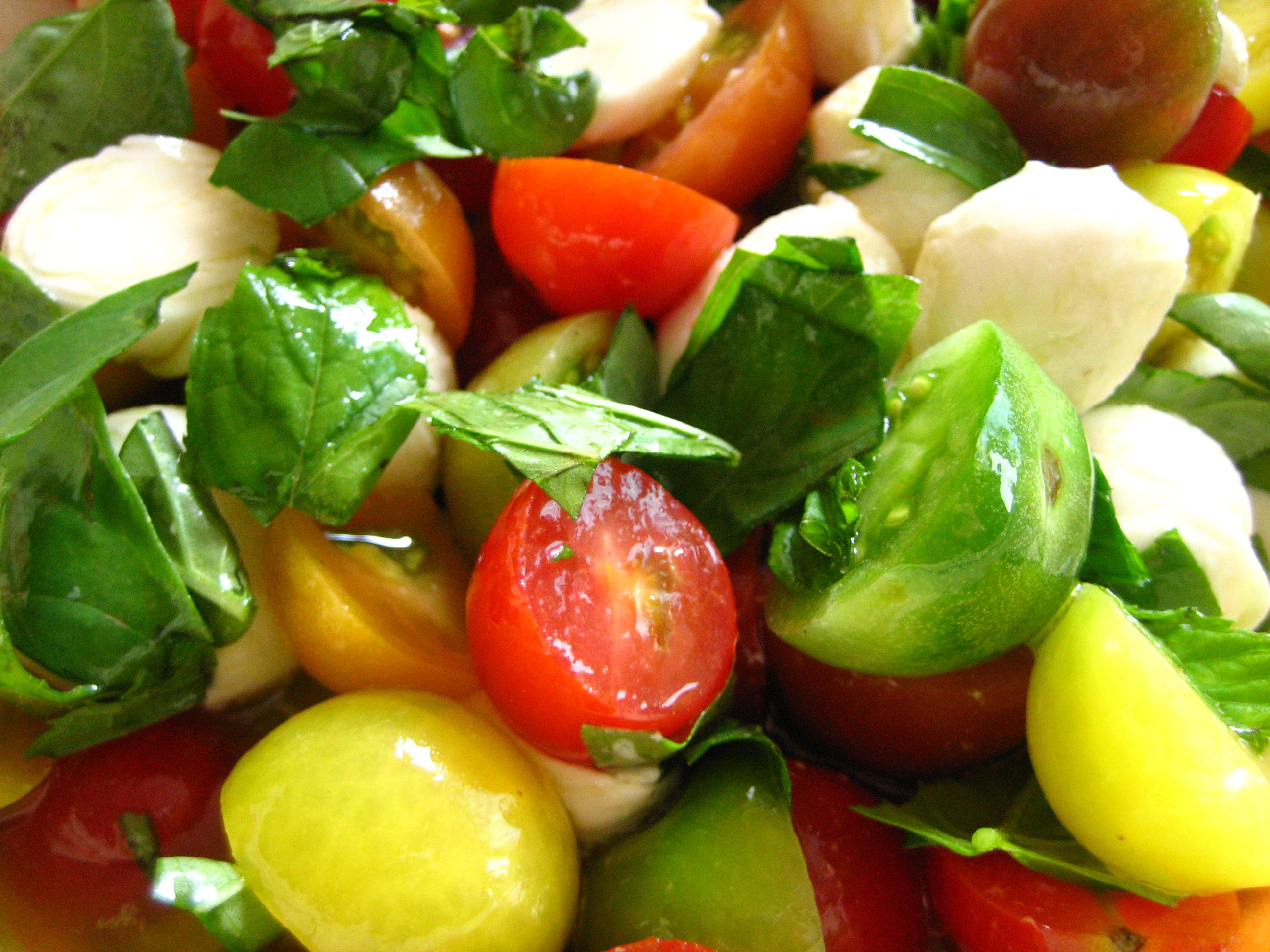 Tomato And Mozzarella Salad
 Ciliegine Tomato Basil Caprese Salad