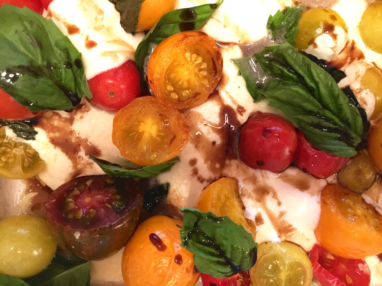 Tomato Caprese Salad
 Roasted Heirloom Tomato Basil Mozzarella Caprese Salad