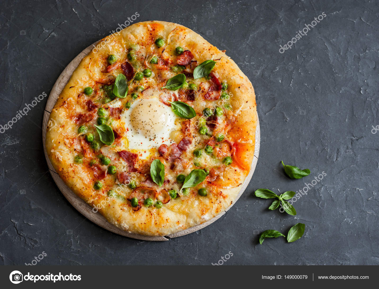 Tops Breakfast Pizza
 Pizza with bacon egg and green peas Breakfast pizza on a