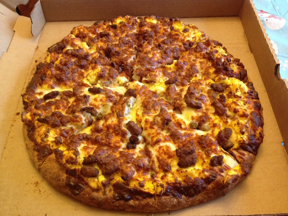 Tops Breakfast Pizza
 The best Breakfast pizza Reasonably priced Call ahead or