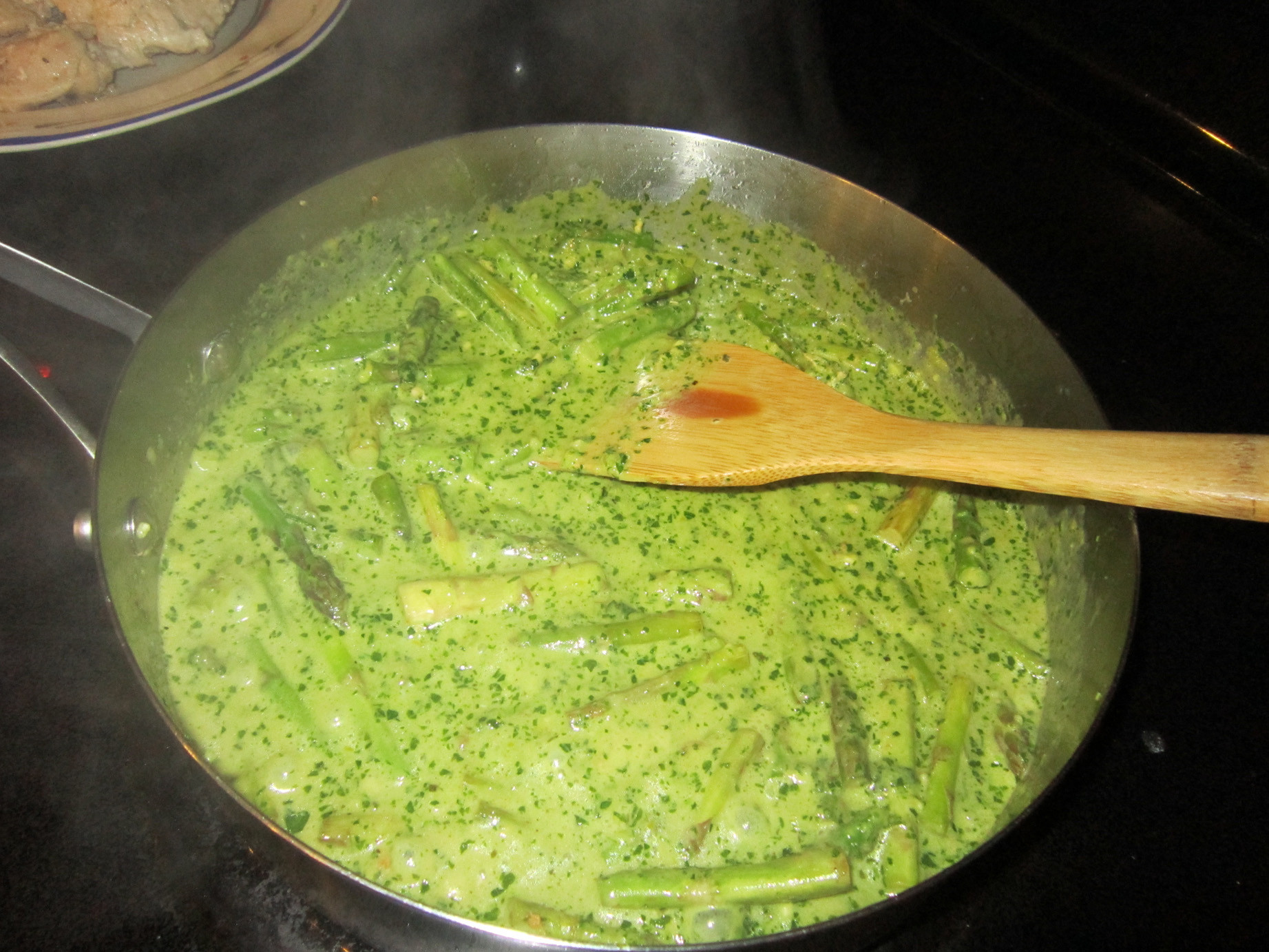 What Is Pesto Sauce
 Chicken Cutlets and Asparagus with Creamy Pesto Sauce