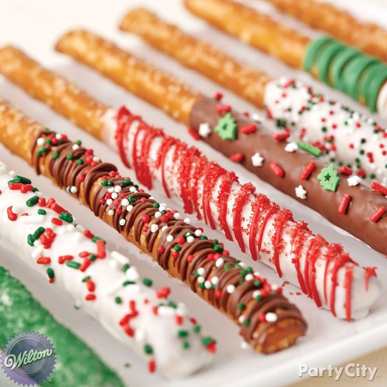 Christmas Chocolate Pretzels
 Dipped pretzel sticks Trays and Caroler on Pinterest
