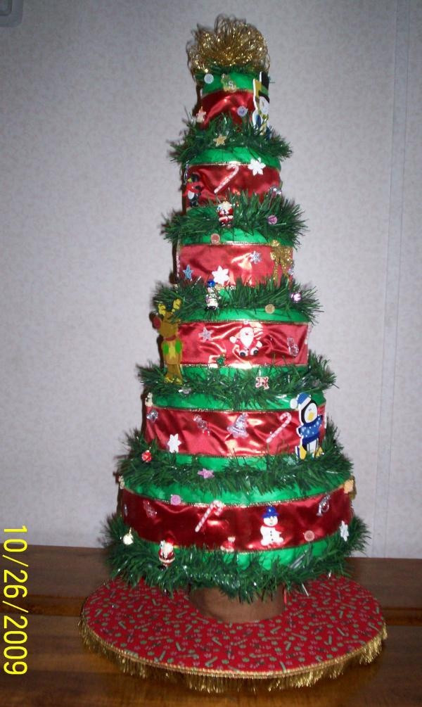 Christmas Diaper Cakes
 6 layer Christmas tree diaper cake in Diaper Cakes by