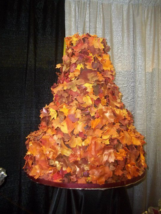 Fall Wedding Cakes With Leaves
 wedding cake covered in fall leaves
