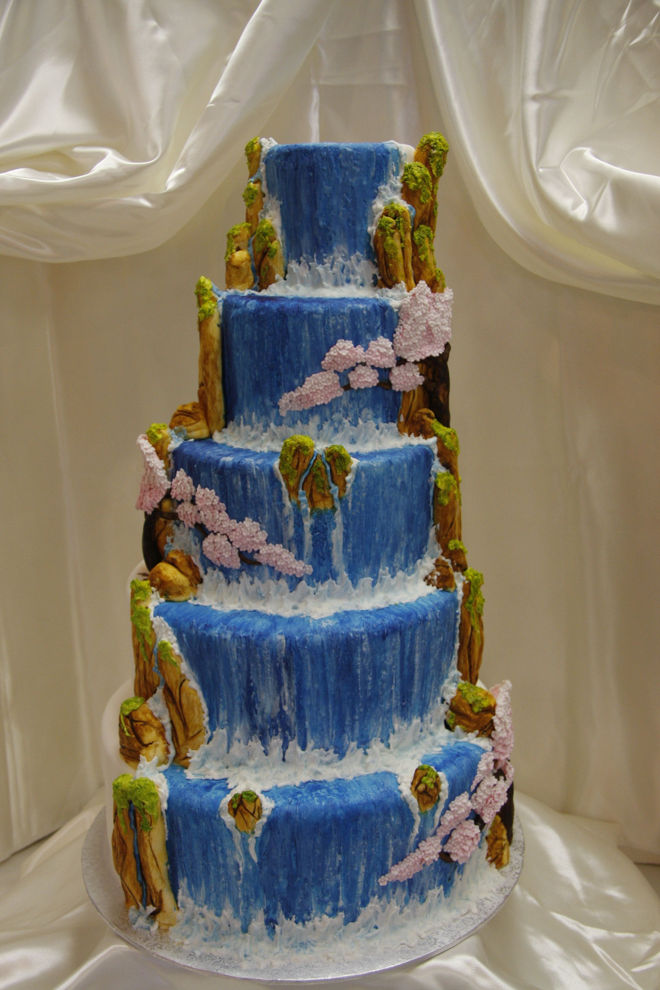 Waterfalls Wedding Cakes
 Hand crafted and hand painted waterfall and cherry blossom